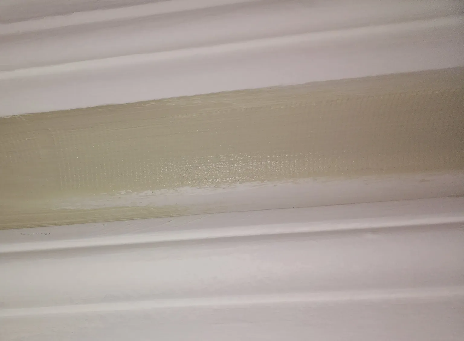 brushed filler over scrim tape